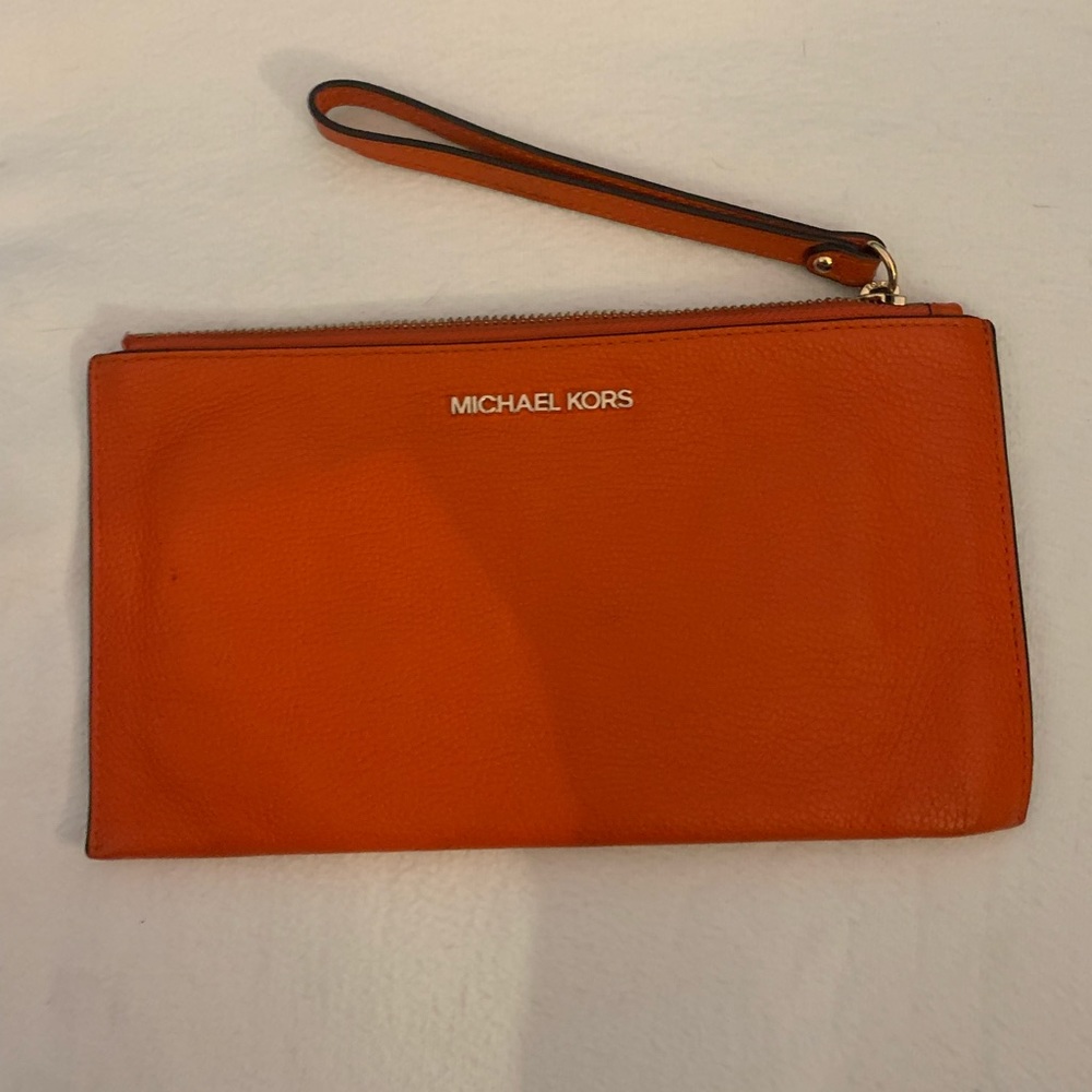 Micheal Kors orange Wristlet